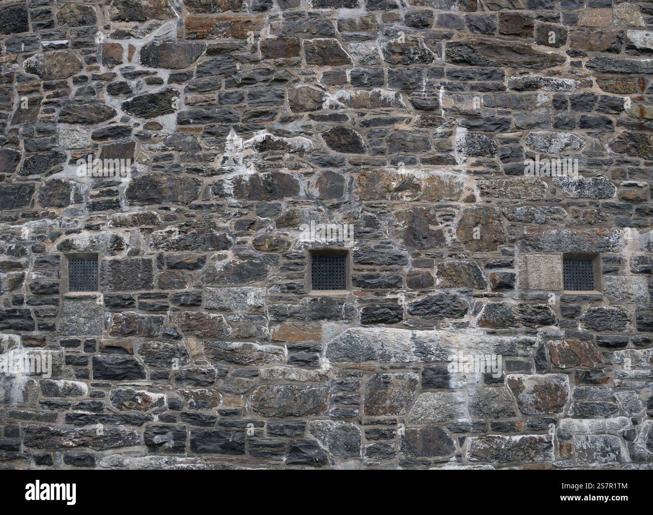 Alte Steinmauern. Abstrakter Hintergrund und Textur für Design mit Kopierraum. Stockfoto