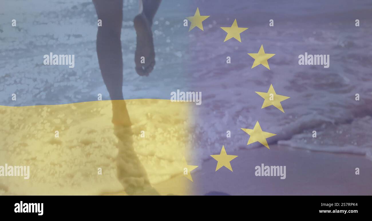 Das Bild der ukrainischen und eu-Flaggen über dem Wasser, das am Strand spritzt Stockfoto