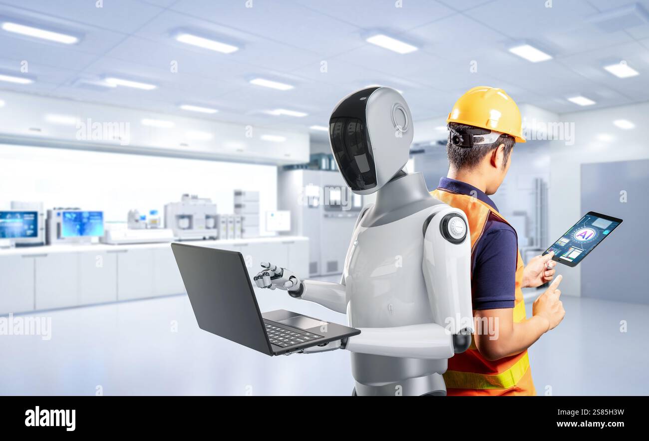 Konzept der Automatisierungsindustrie mit Ingenieurarbeit mit Assistenzroboter Stockfoto