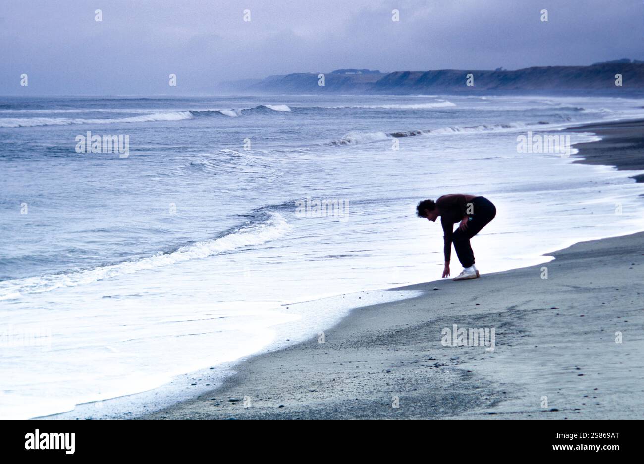 Frau am Strand Stockfoto