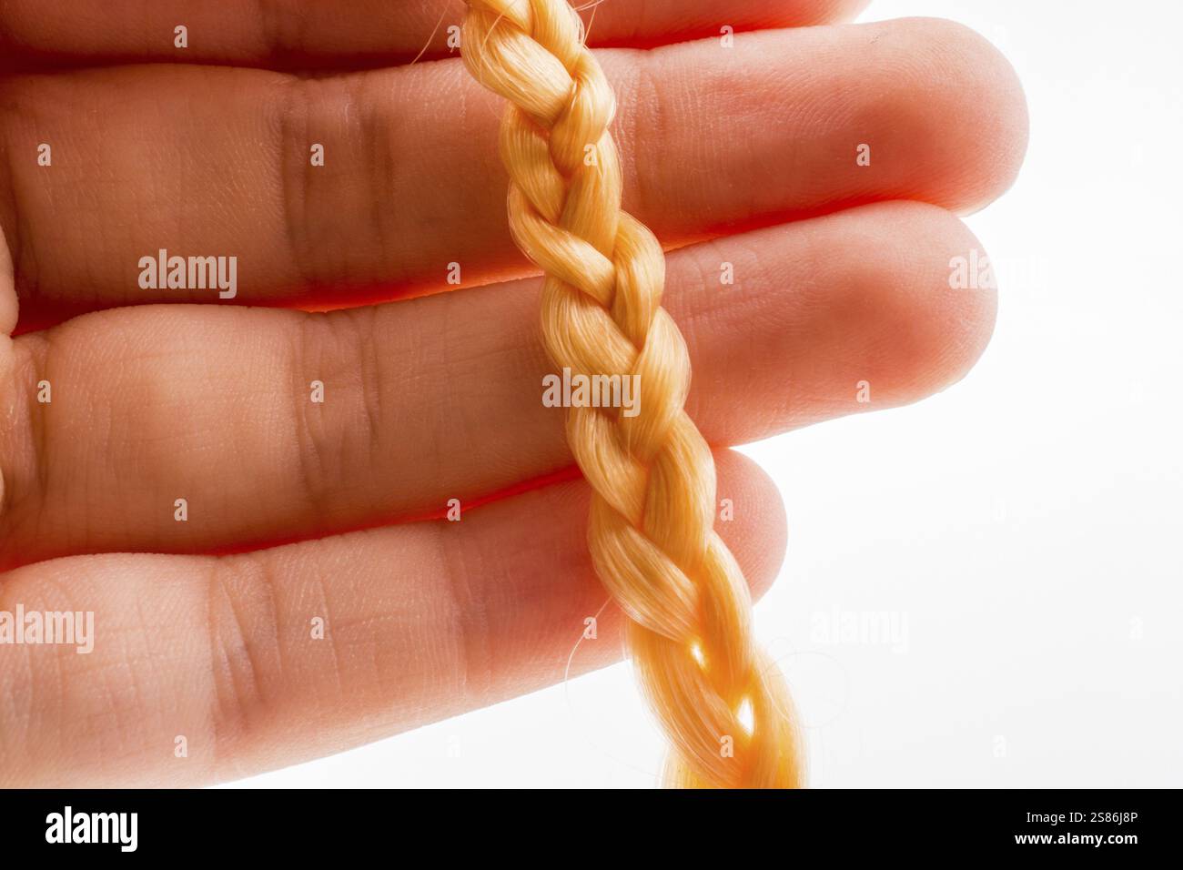 Fake Zöpfe Material für Frisuren close-up Textur Stockfoto Fake Zöpfe Material für Frisuren close-up Textur Stockfoto