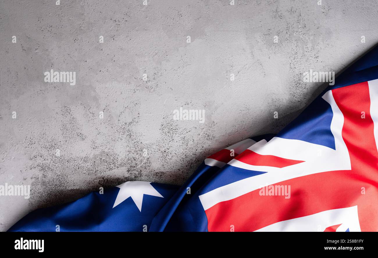 Happy Australia Day Konzept. Australische Flagge vor Steingrund. 26. Januar. Stockfoto