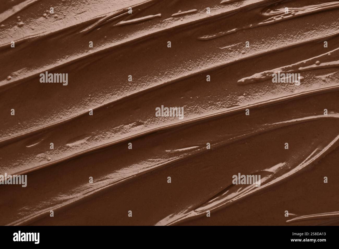 Mokka-Mousse als Hintergrund, Draufsicht. Farbe: 2025 Jahre Stockfoto