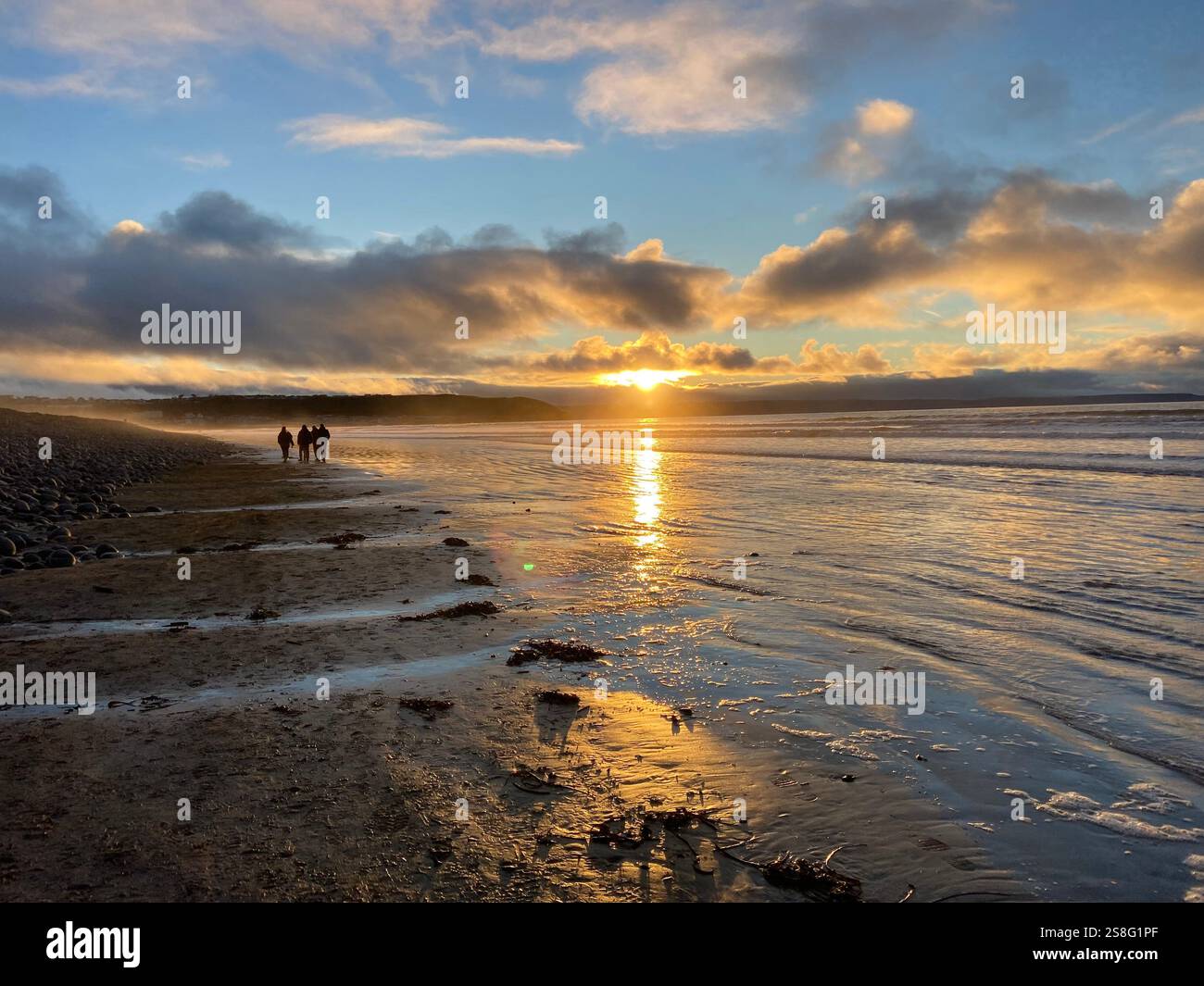 Sonnenuntergang am Strand in Westward Ho! Stockfoto