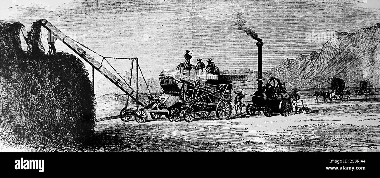 Gravur mit Dampf angetriebenen Dreschmaschine. Vom 20. Jahrhundert Stockfoto
