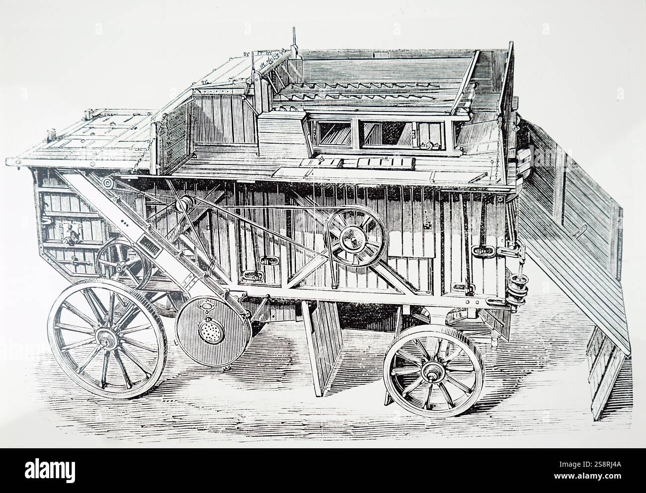 Gravur mit Dampf angetriebenen Dreschmaschine. Vom 20. Jahrhundert Stockfoto