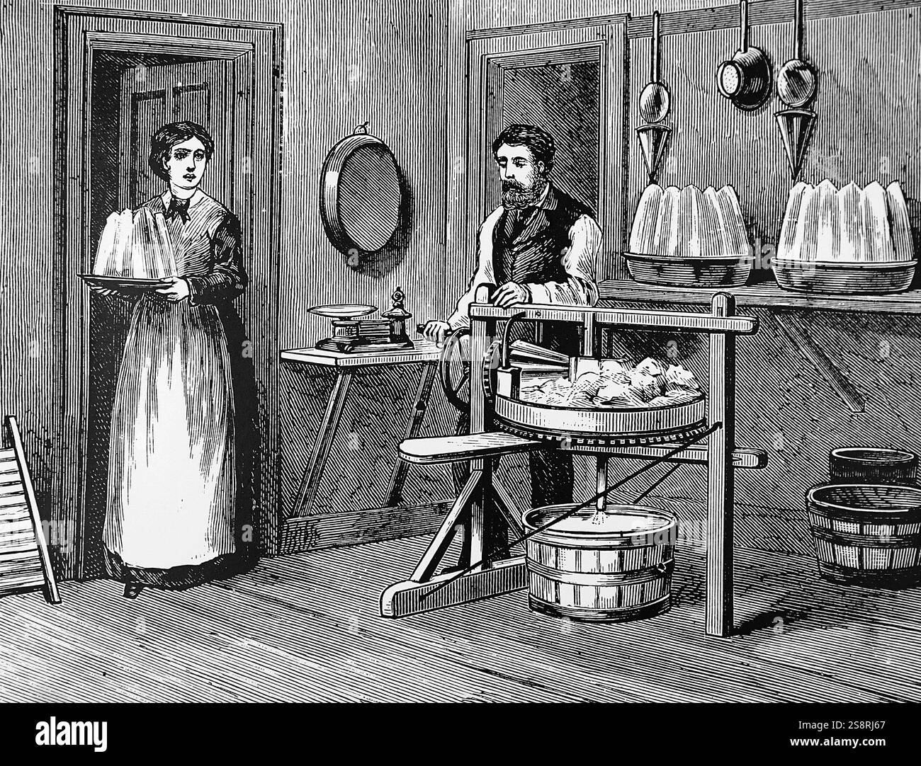 Kupferstich mit der Darstellung der Verwendung eines Hand-angetriebene Butter arbeitende Maschine, in denen überschüssige Buttermilch entfernt wurde und Salz gemischt in. Butter würde auf einem Revolvierenden runder Tisch platziert werden und wiederholt bestanden unter einer geriffelten Walze. Die Buttermilch in den Eimer unter der Tabelle abgeleitet. Vom 19. Jahrhundert Stockfoto