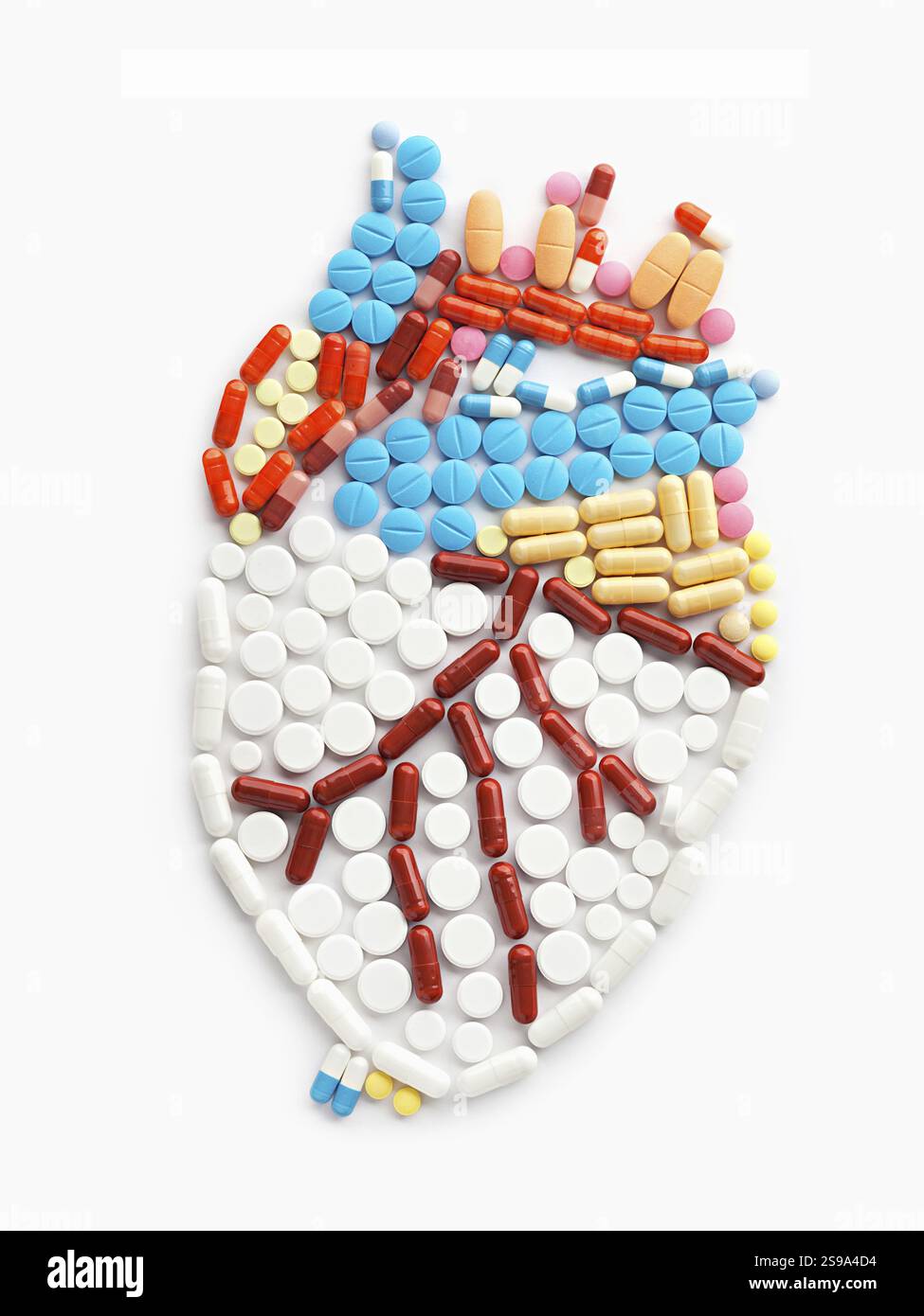Medikamente und Pillen in Form eines menschlichen Herzens Stockfoto