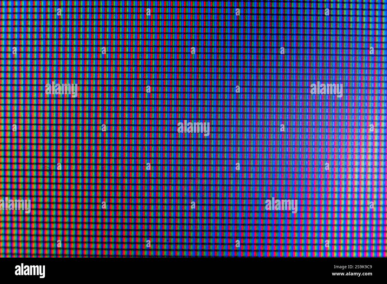 Detaillierte Makroaufnahmen des LCD-Monitors mit komplexen Pixeln und Mustern Stockfoto