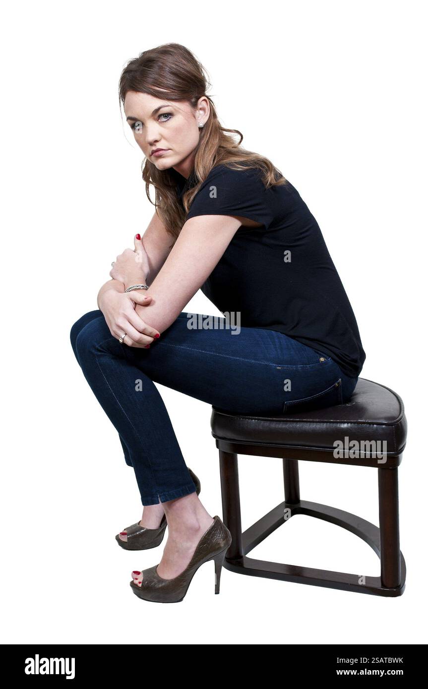 Eine schöne junge Frau weit wegschauen Stockfoto