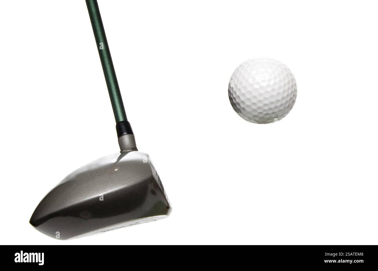 Ein Fahrer, kurz bevor er einen Golfball trifft Stockfoto