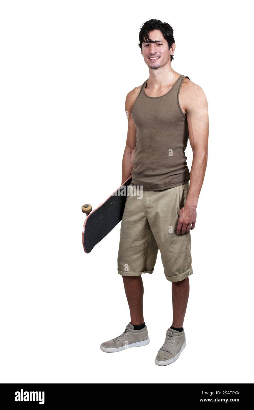 Hübscher junger Mann mit einem Skateboard bereit zu reiten Stockfoto