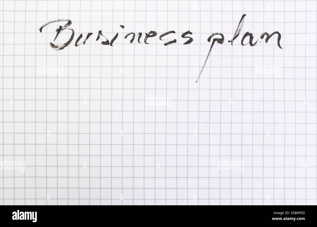 Businessplan handgeschrieben mit schwarzer Tinte auf einer mathematischen Buchseite, leerer Kopierraum Stockfoto