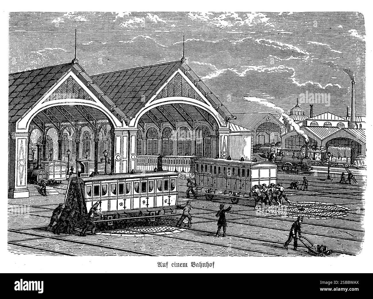 Belebter Bahnhof, in dem die Arbeiter manuell Eisenbahnwagen entlang der Gleise schieben und manövrieren. Die Szene fängt die rohe, düstere Arbeit des industriellen Zeitalters ein, mit Männern in Arbeitskleidung, die sich um die schweren Wagen kümmern. Die Architektur des Bahnhofs mit seinem eisernen Rahmen und den Glasvordächern erhebt sich über dem Dach, während Dampfloks und Pkw den Hintergrund bevölkern. Diese Momentaufnahme der historischen Industrie spiegelt die Abhängigkeit der Ära von menschlicher Stärke und Entschlossenheit angesichts des aufkeimenden technologischen Fortschritts wider. Stockfoto