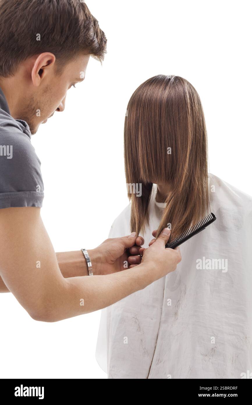 Professionelle Friseur mit langen Haaren Modell, isoliert auf weißem Stockfoto