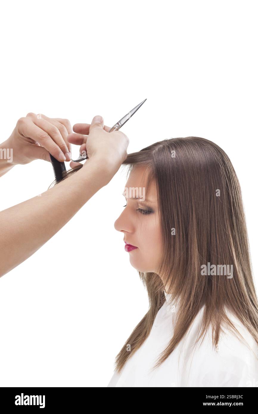 Professionelle Friseur mit langen Haaren Modell, isoliert auf weißem Stockfoto