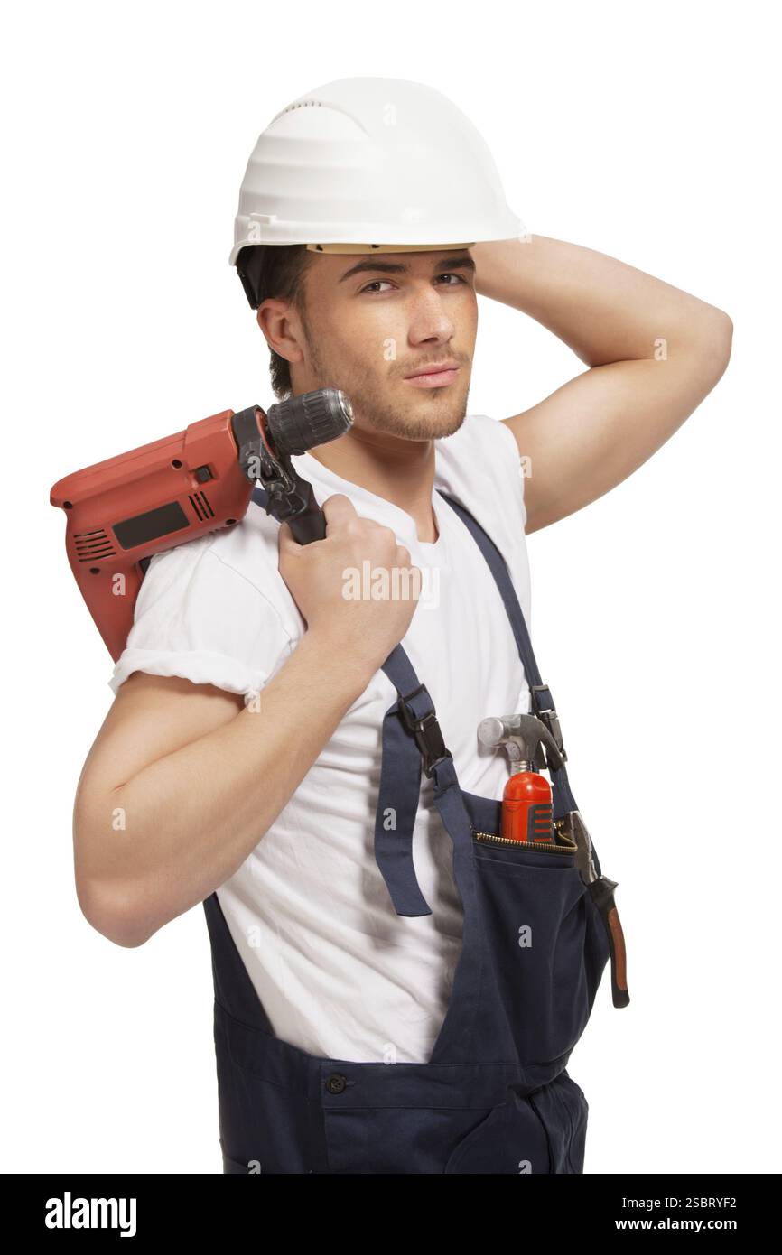 Porträt eines jungen Handwerkers mit Werkzeug, auf weißem Hintergrund Stockfoto