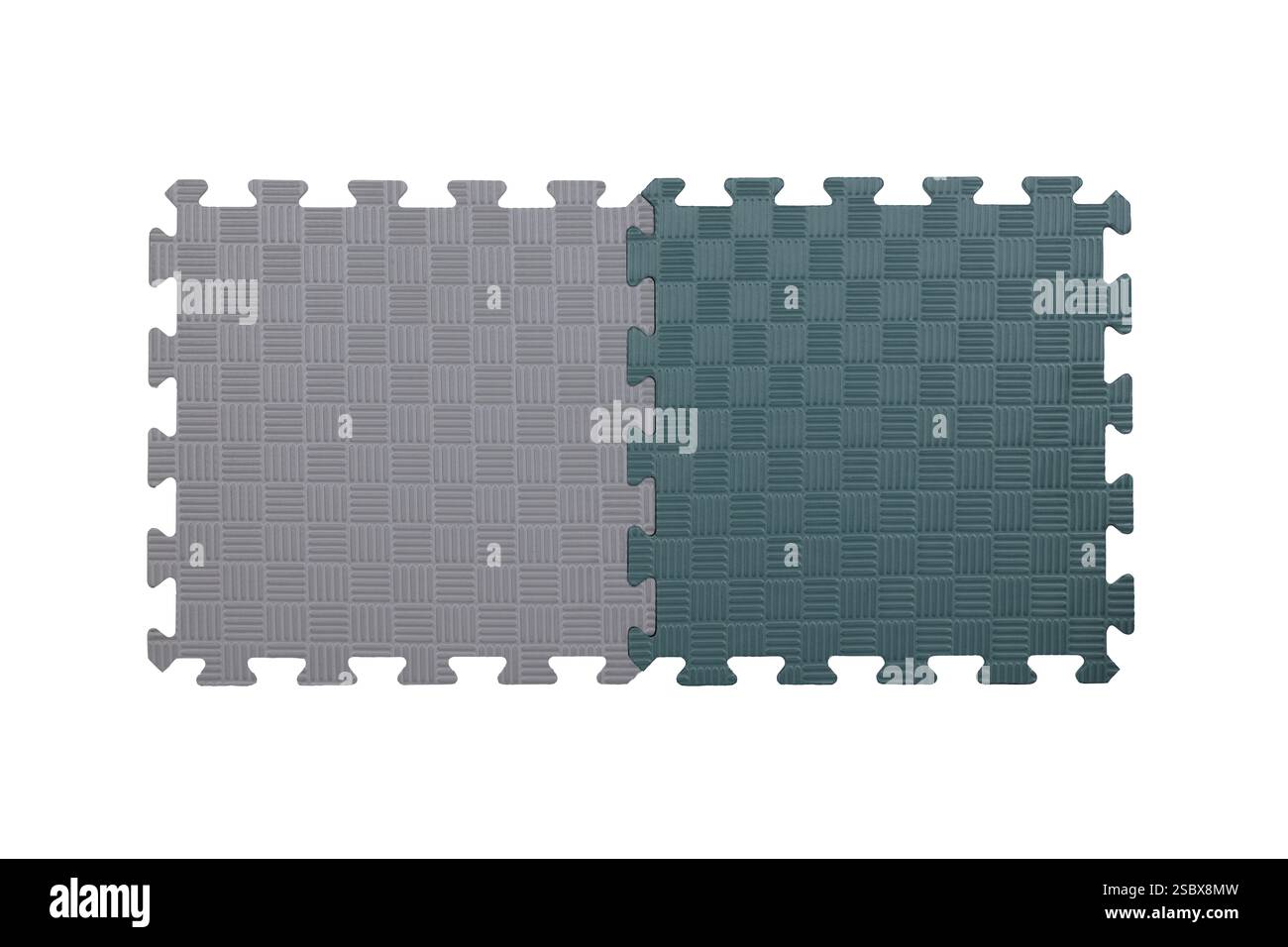 Ineinandergreifende graue und grüne EVA-Schaumstoffmatten – strapazierfähige Puzzle-Bodenfliesen für Fitnessstudio, Training und Sicherheitspolsterung Stockfoto