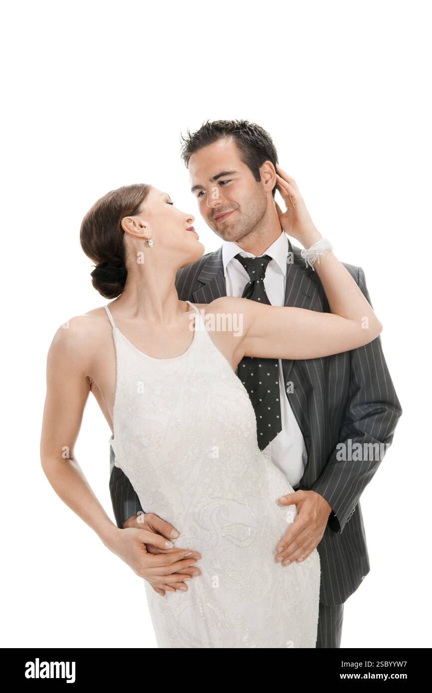 Modepaar, Studio-Aufnahme. Isoliert auf weißem Hintergrund Stockfoto