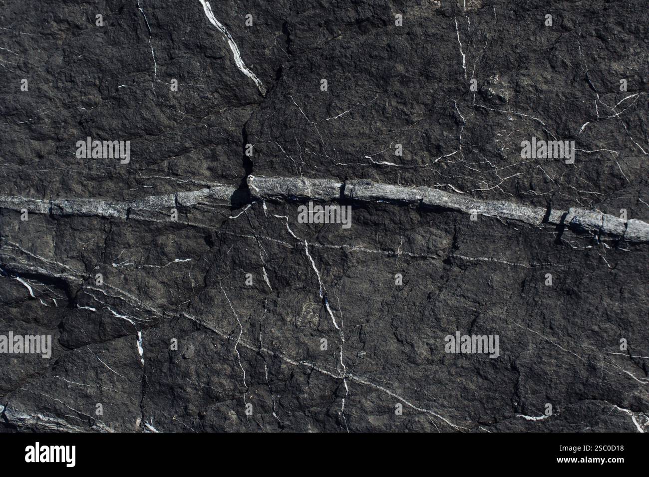 Naturstein oder Steinoberfläche als Hintergrundstruktur Stockfoto