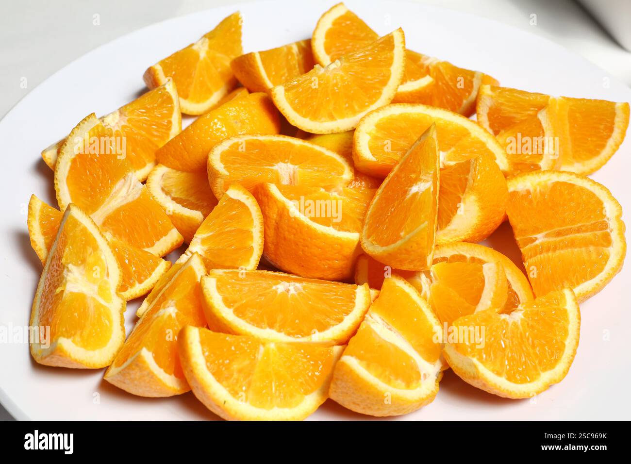In Scheiben Geschnittene Orangefarbene Keile Stockfoto