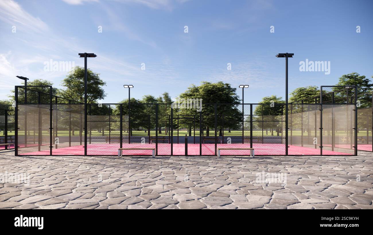 Padel-Platz im Freien mit rosafarbener Oberfläche, ausgestattet mit Flutlichtern und Glas Stockfoto