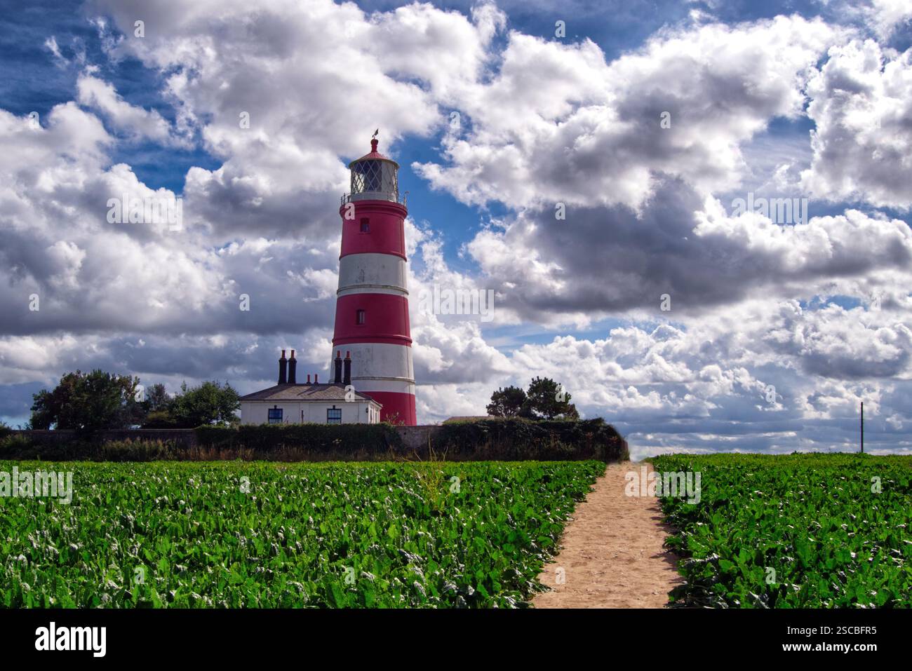 Happisburgh Leuchtturm vor einem bewölkten Himmel Stockfoto