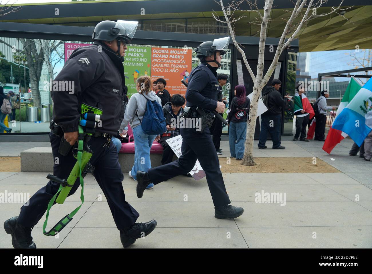 Los Angeles Riot Police officers rush to assist high school students ...