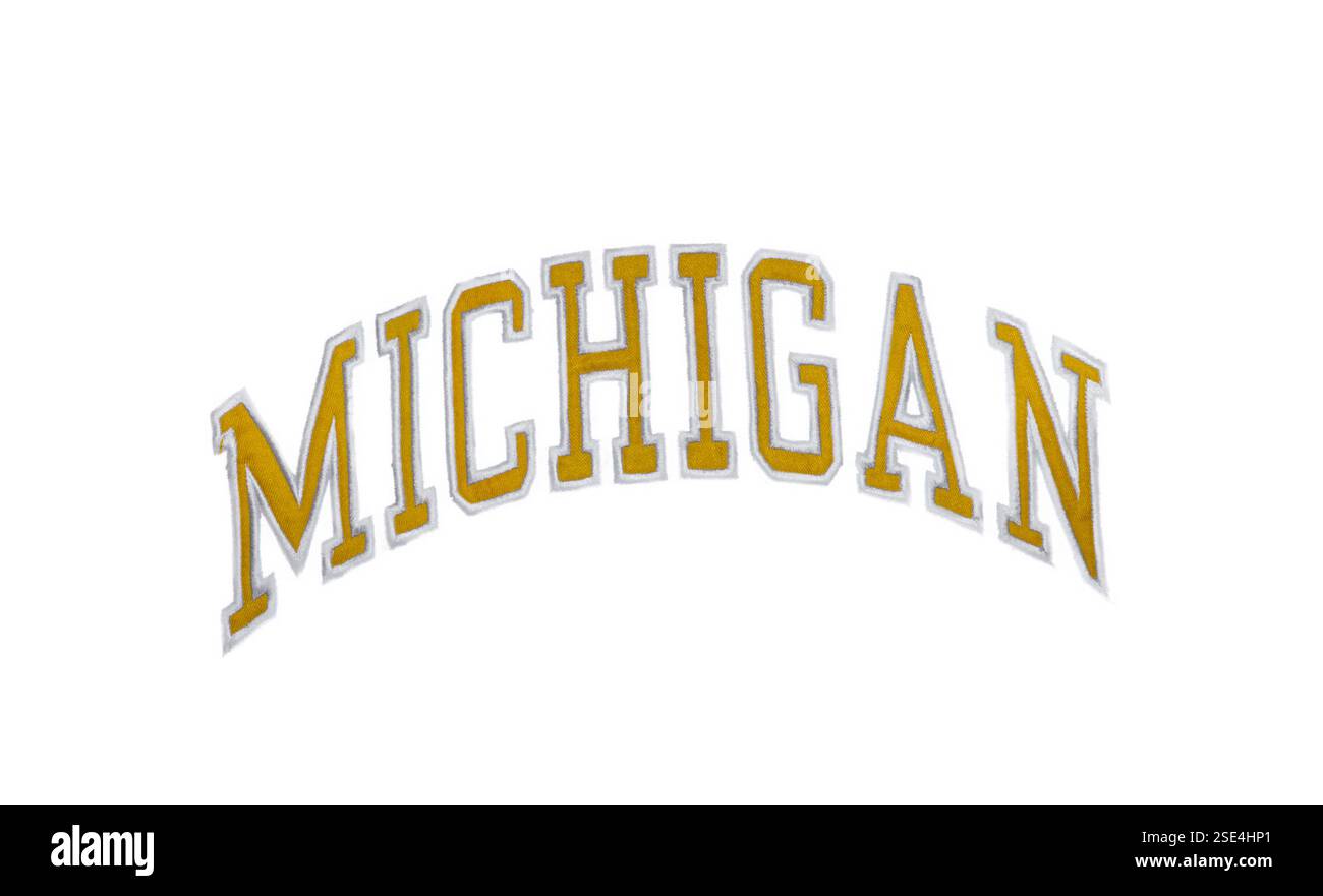 Ann Arbor, MI - 12. November 2024 University of Michigan NCAA College Football Maisgelb Farbe. Das Logo in Block M in der Schriftart Victors. Isolieren Stockfoto