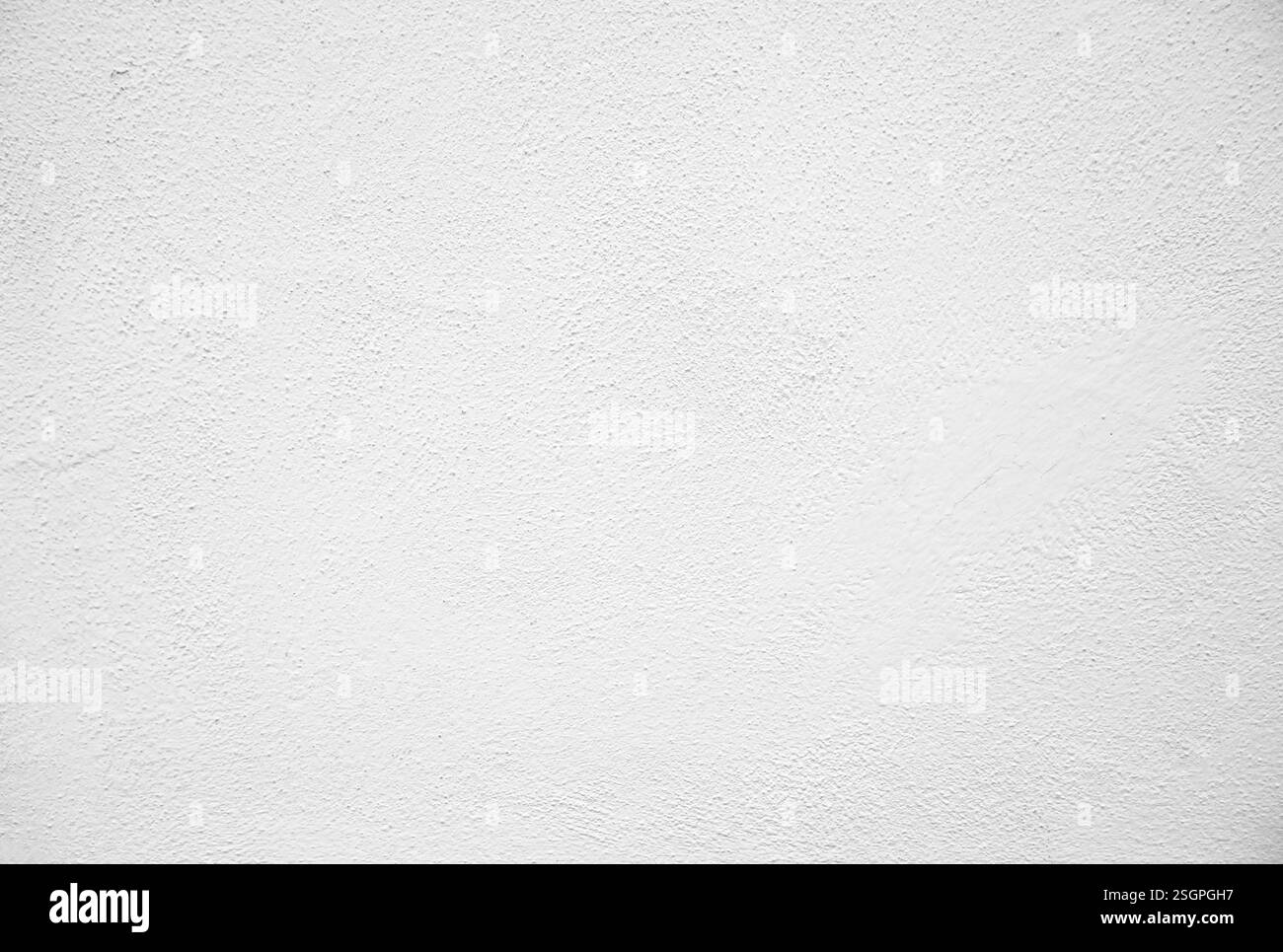 Raue Textur oder Hintergrund einer hellen Putzwand Stockfoto