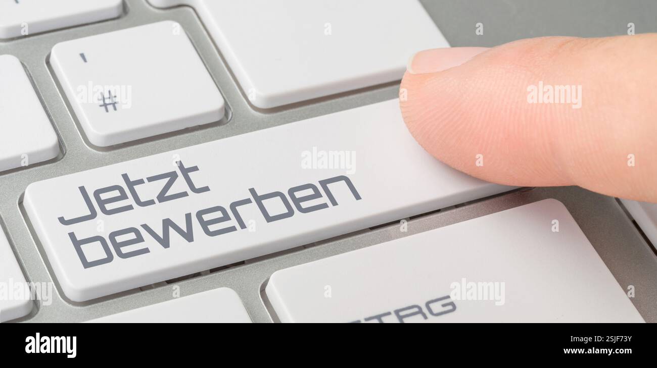 Tastatur mit beschrifteter Taste – jetzt anwenden Stockfoto