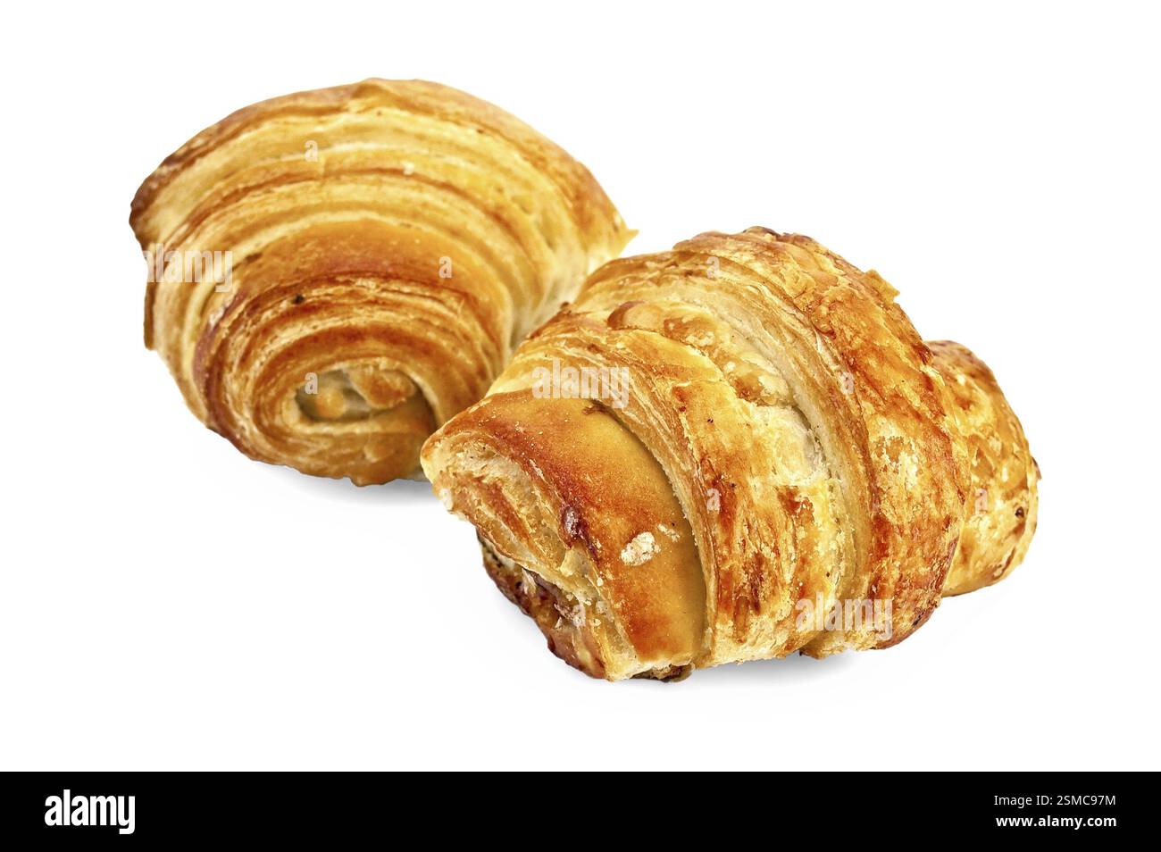 Zwei goldene Croissants auf weißem Hintergrund Stockfoto