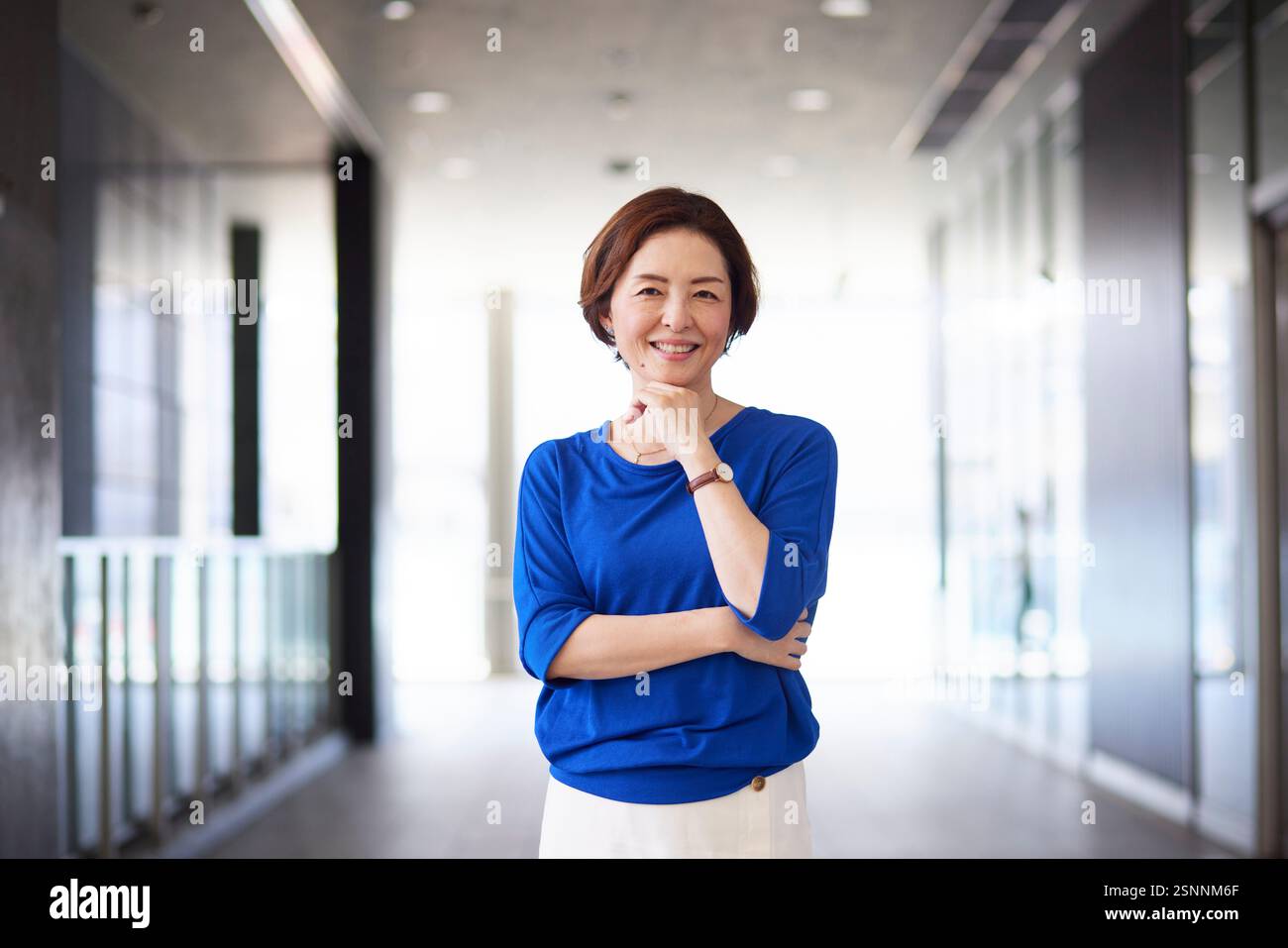 Porträt einer lächelnden japanischen Geschäftsfrau Stockfoto