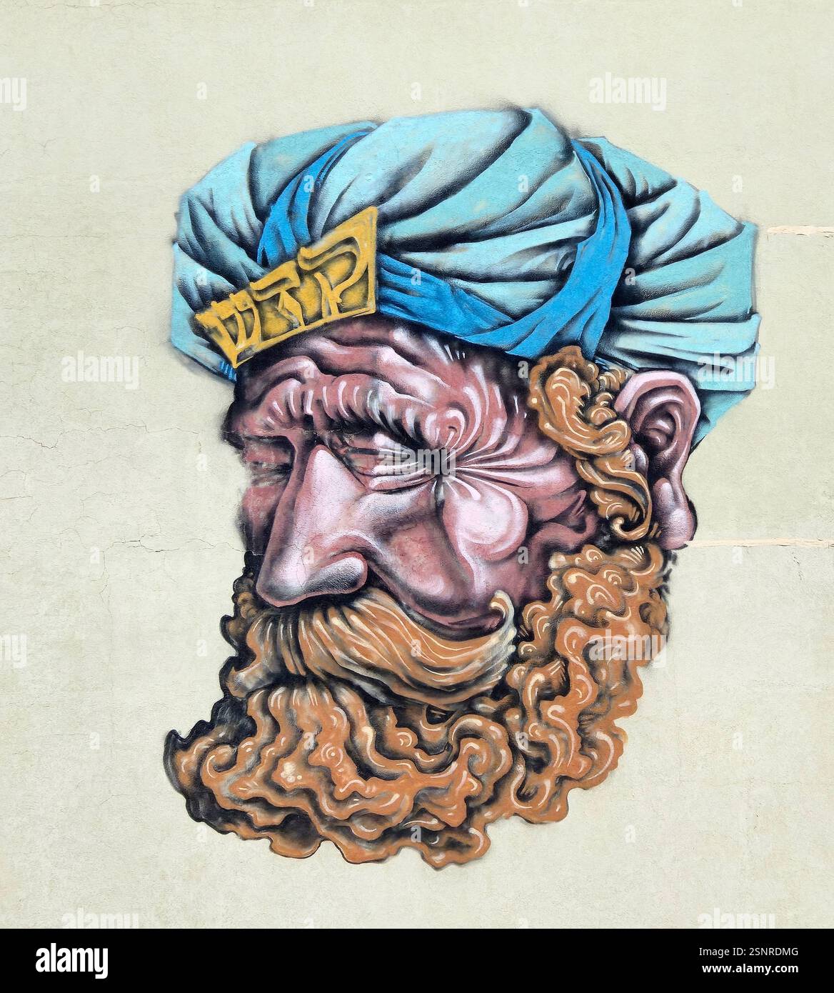 Ein wunderschönes Wandbild eines älteren Mannes, der einen blauen Turban trägt, gemalt an einer Wand eines Gebäudes in Jerusalem, Israel. Stockfoto