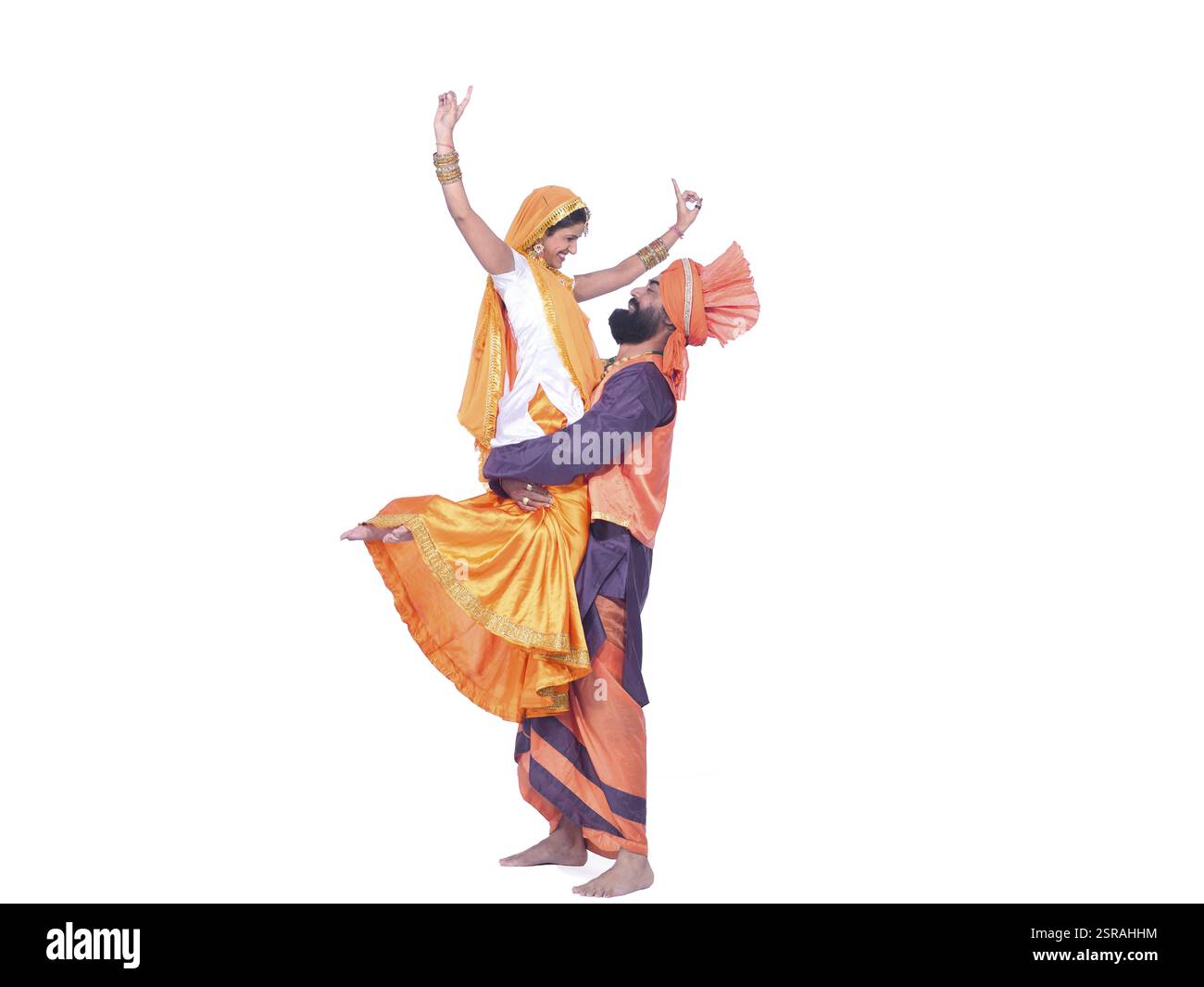 Tänzerinnen und Tänzer, die Folk Dance Bhangra MR#779E, 779C aufführen Stockfoto