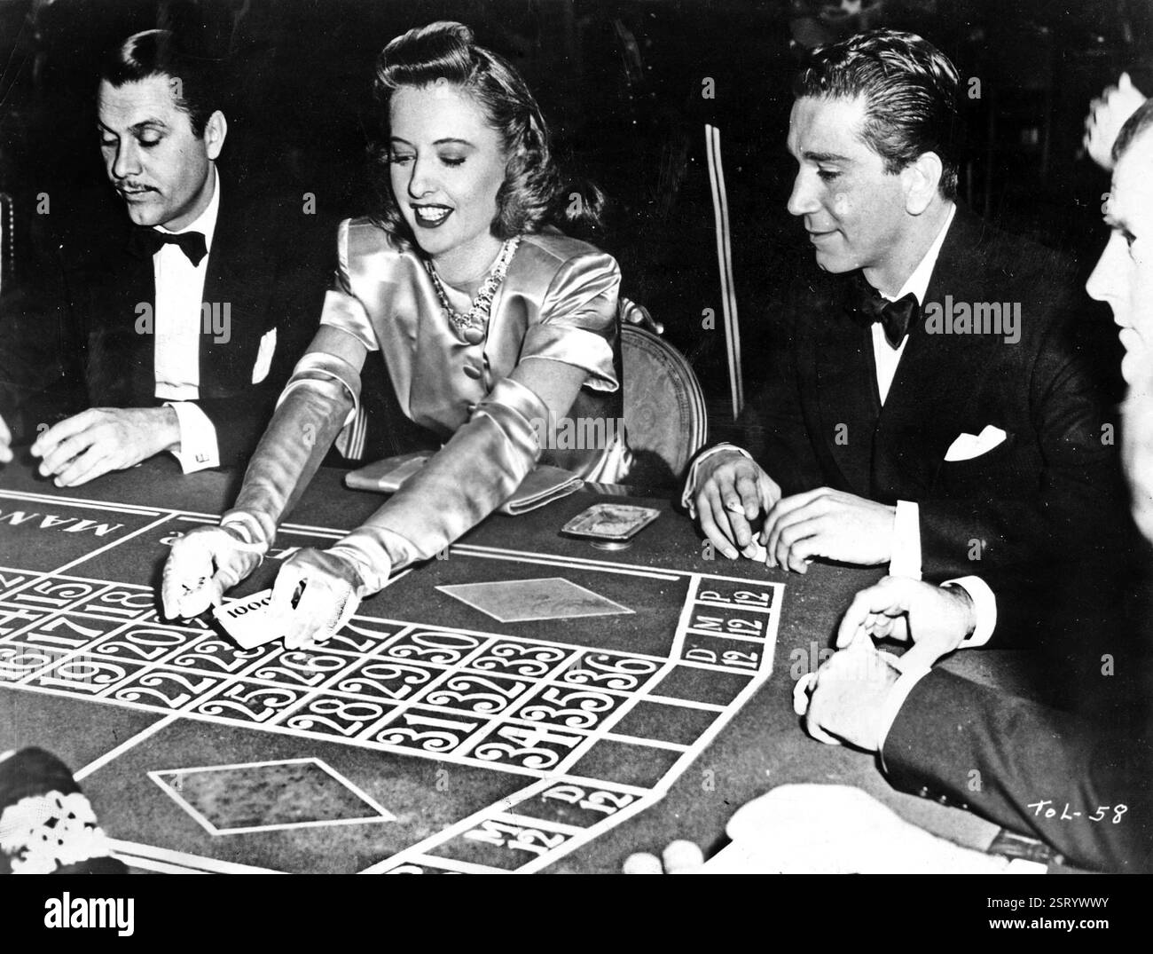 DIE ANDEREN LIEBEN BARBARA STANWYCK, RICHARD CONTE Datum: 1947 Stockfoto