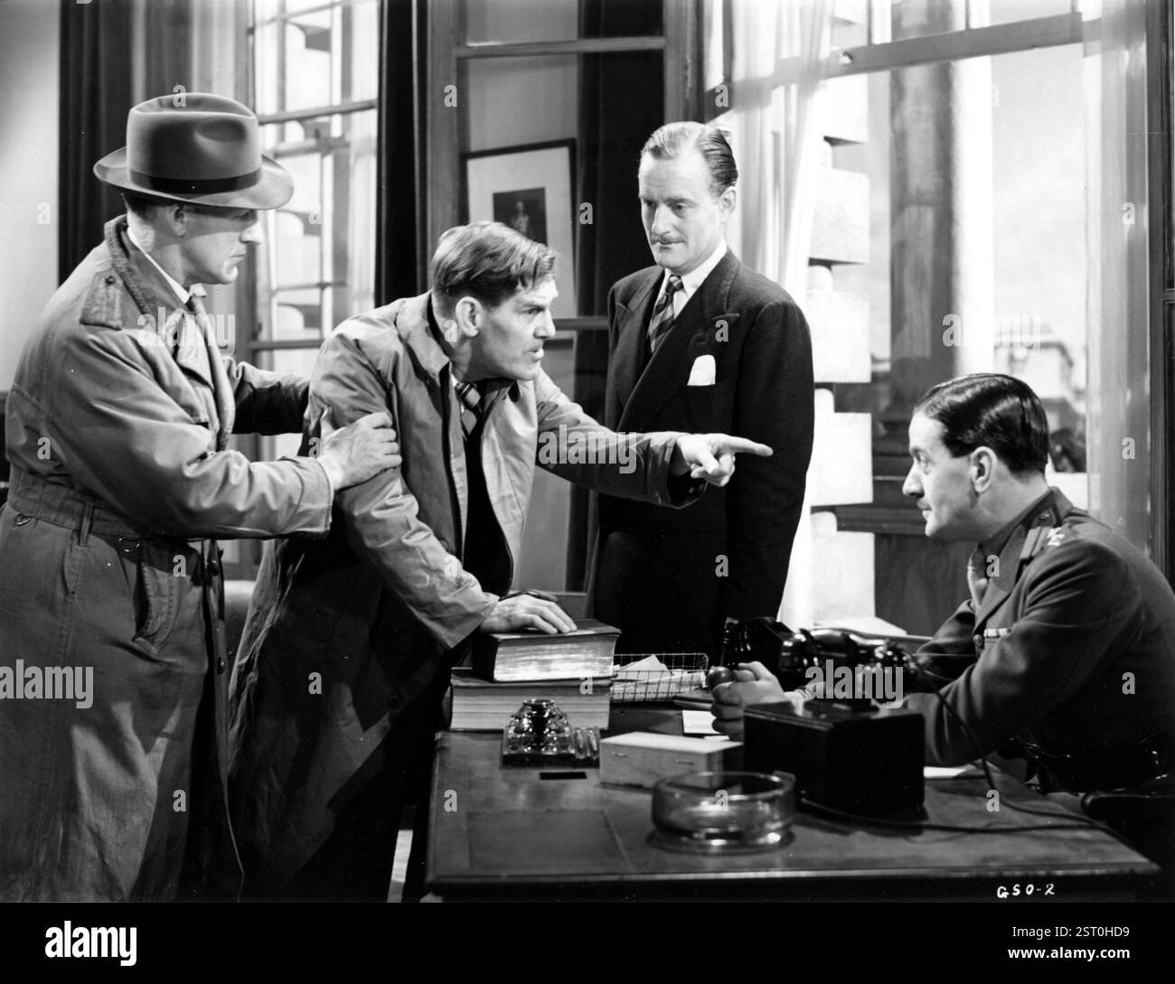 DIE GANS TRITT AUS [BR 1942], WILL HEY [Zweiter von links], JOHN WILLIAMS, LAWRENCE MADDEN Datum: 1942 Stockfoto