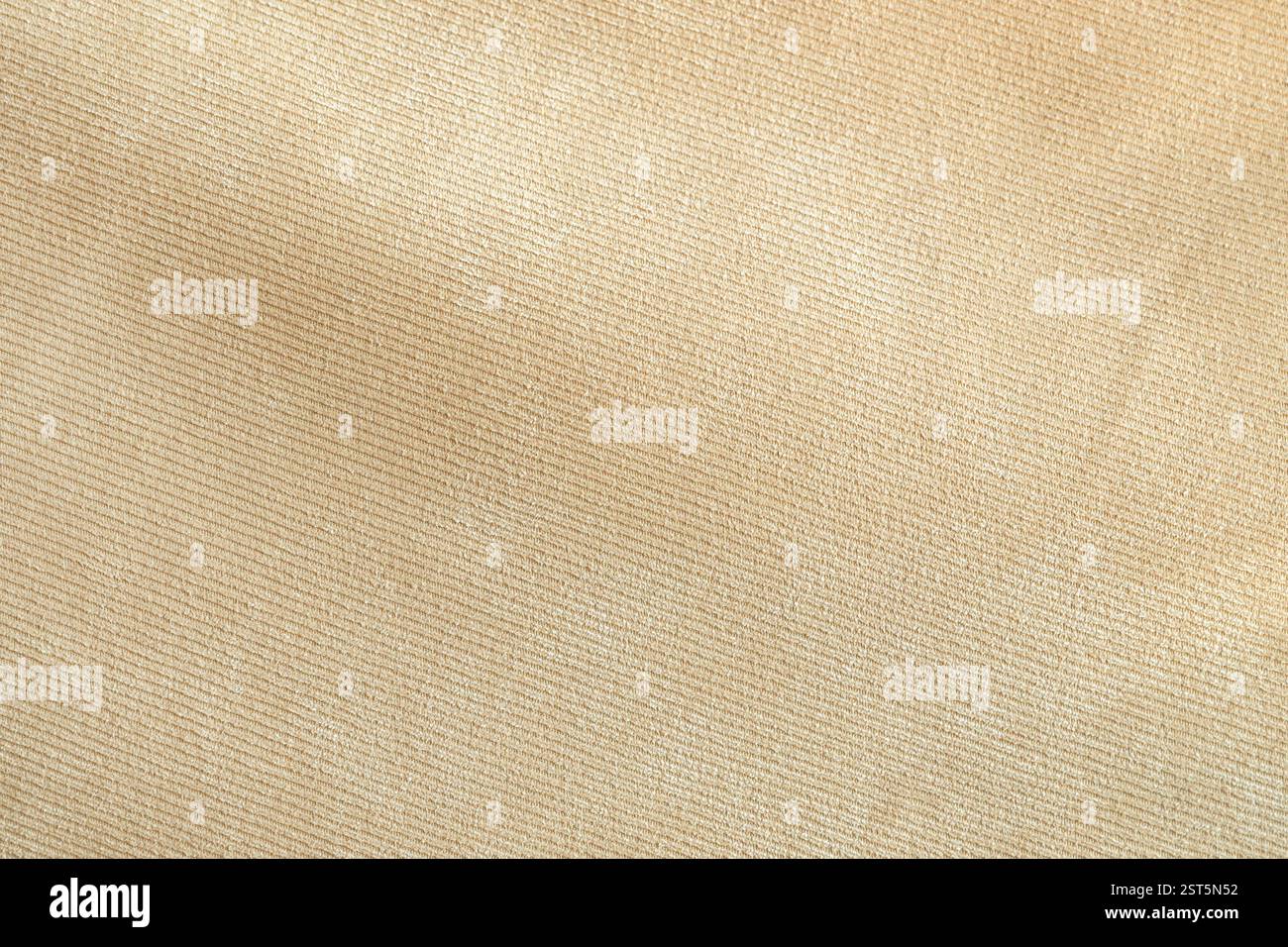 Beigefarbenes Sofa Couch Stoff Muster Textur als Hintergrund, Draufsicht Stockfoto