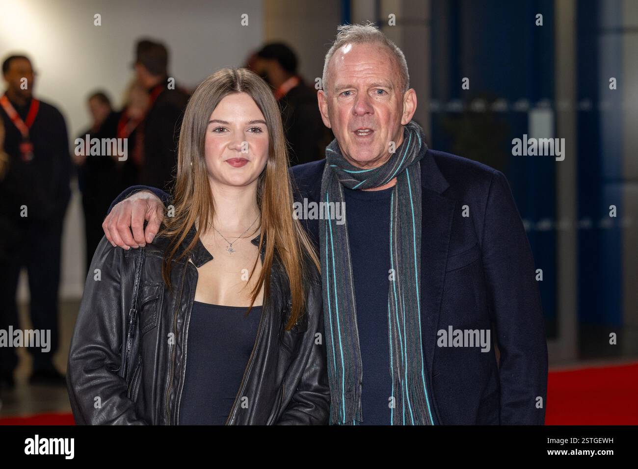 (L-R). Nelly Cook und Norman Cook alias Fat Boy Slim besuchen den roten Teppich für F1 75 Live, als Formel 1 die Saison 2025 beim O2 in London startet Stockfoto