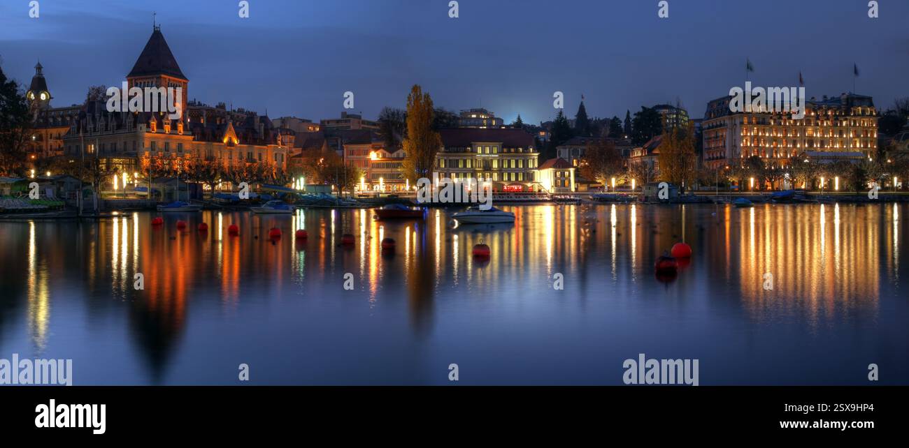 HDR-Panoramabild der Uferpromenade des Genfer Sees im Hafen von Ouchy, Lausanne, Schweiz. Auf der linken Seite befindet sich das Chateau d'Ouchy mit einem 12. Jahrhundert Stockfoto