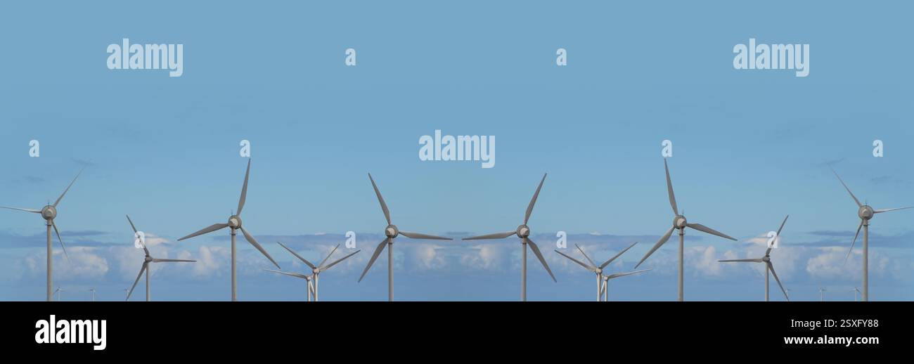 Windturbinen gegen blauen Himmel. Banner oder Header für umweltfreundliche Energie Stockfoto