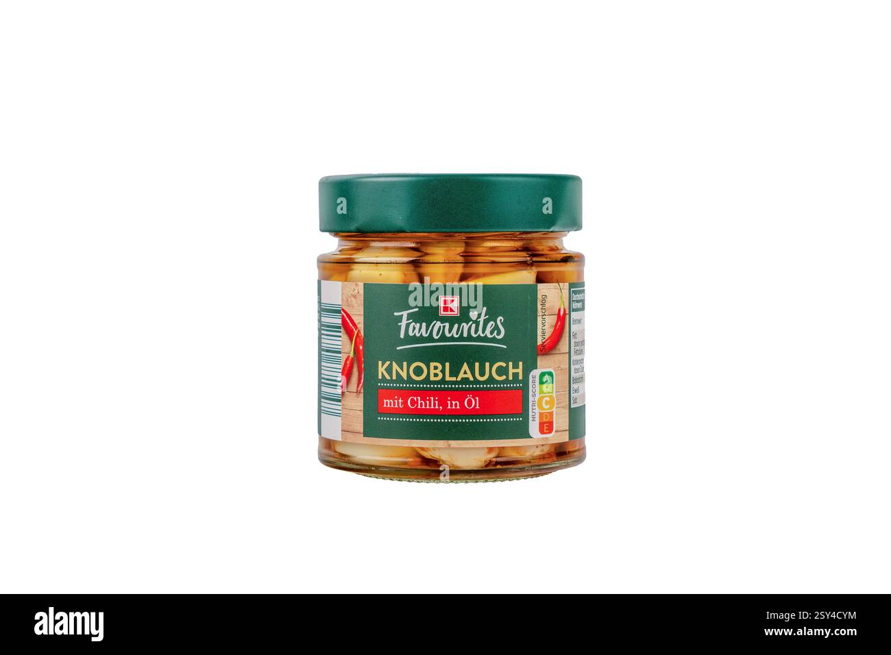 Deutschland Berlin 26. Februar 2025. Ein Glas Knoblauch steht auf weißem Hintergrund. Glas mit eingelegtem Knoblauch in Öl. Stockfoto