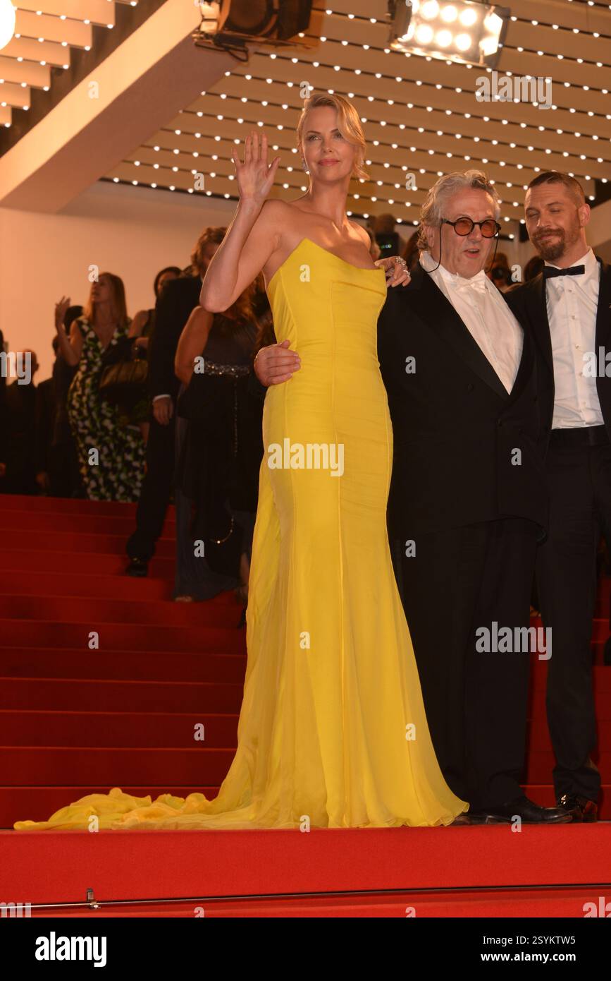 Charlize Theron, George Miller, Tom Hardy verließ die Premiere von Mad Max: Fury Road während des 68. Jährlichen Filmfestivals in Cannes am 14. Mai 2015 in C Stockfoto