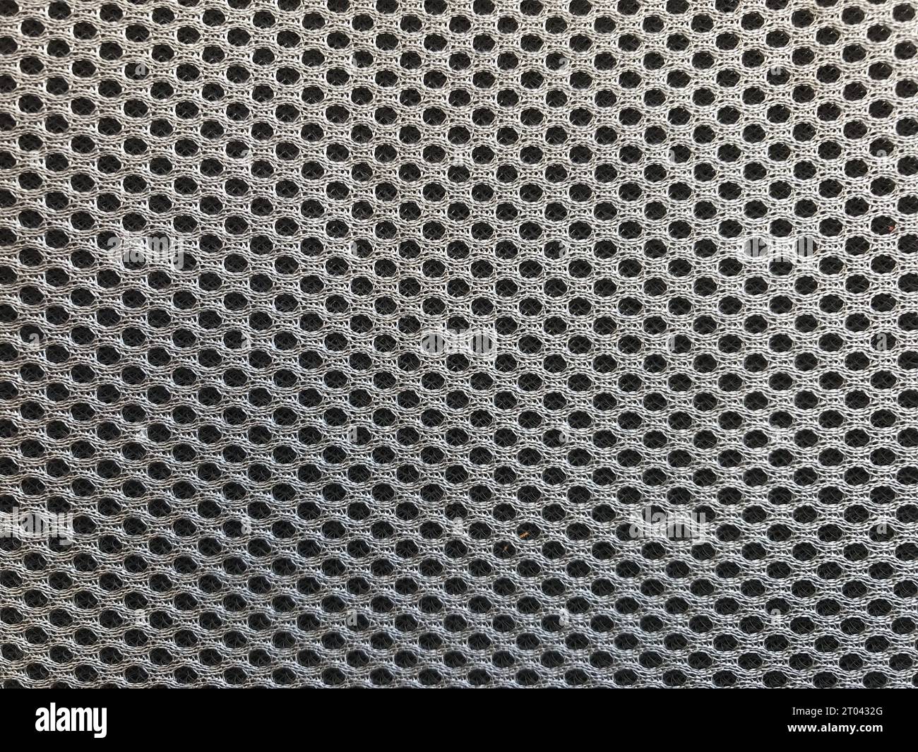 Hellbrauner abstrakter Hintergrund aus Stoff Stockfoto