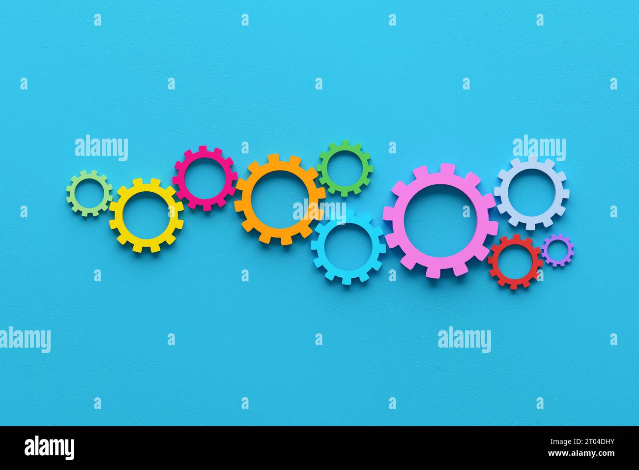 Konzept für Geschäftsprozesse, Teamarbeit und Workflow-Automatisierung. Zahnräder oder Zahnräder auf blauem Hintergrund. Stockfoto
