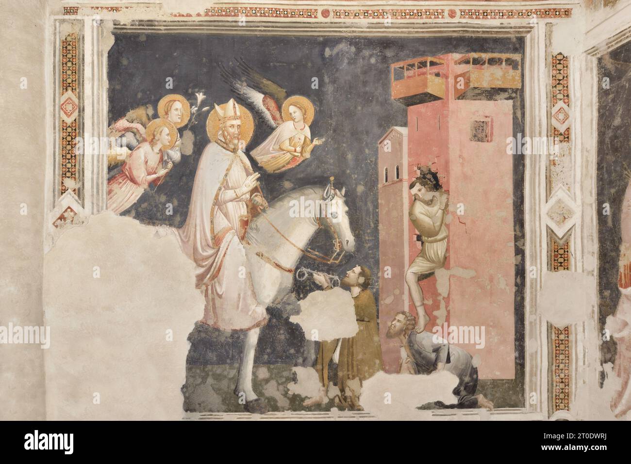 Fabriano (Marken - an), Kirche Sant'Agostino. Kapelle von Sant'Agostino mit Fresken der fabrianisch-riminesischen Schule (Maestro di Sant'Emiliano), 14. Jahrhundert. Der Heilige Augustinus tröstet einige Gefangene zu Pferd, begleitet von Engeln Stockfoto