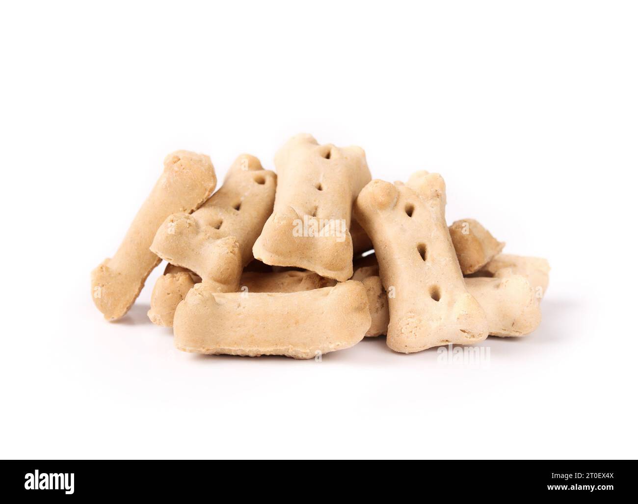 Isolierte Hundemilch-Knochen-Kekse in einem Haufen. Viele knochenförmige Leckereien, Snacks oder für Gehorsamstraining. Hergestellt aus Mehl, Knochenmehl und Rindfettfleisch. Sel Stockfoto