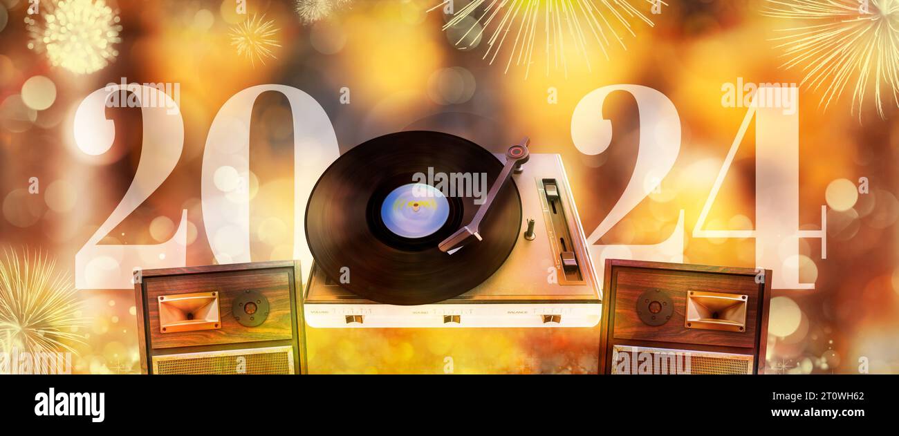 Neujahrsankündigung 2024 mit Plattenspieler, Lautsprechern und unscharfem goldenem Hintergrund und Feuerwerk Stockfoto