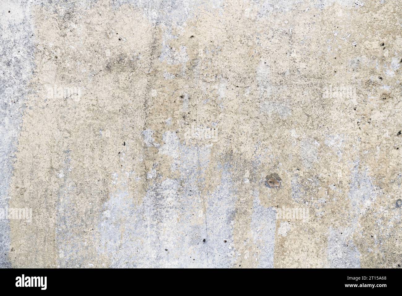 Schmutzige Wandstruktur. Grunge-Beton-Textur. Risse und Späne an der Wand... Stockfoto
