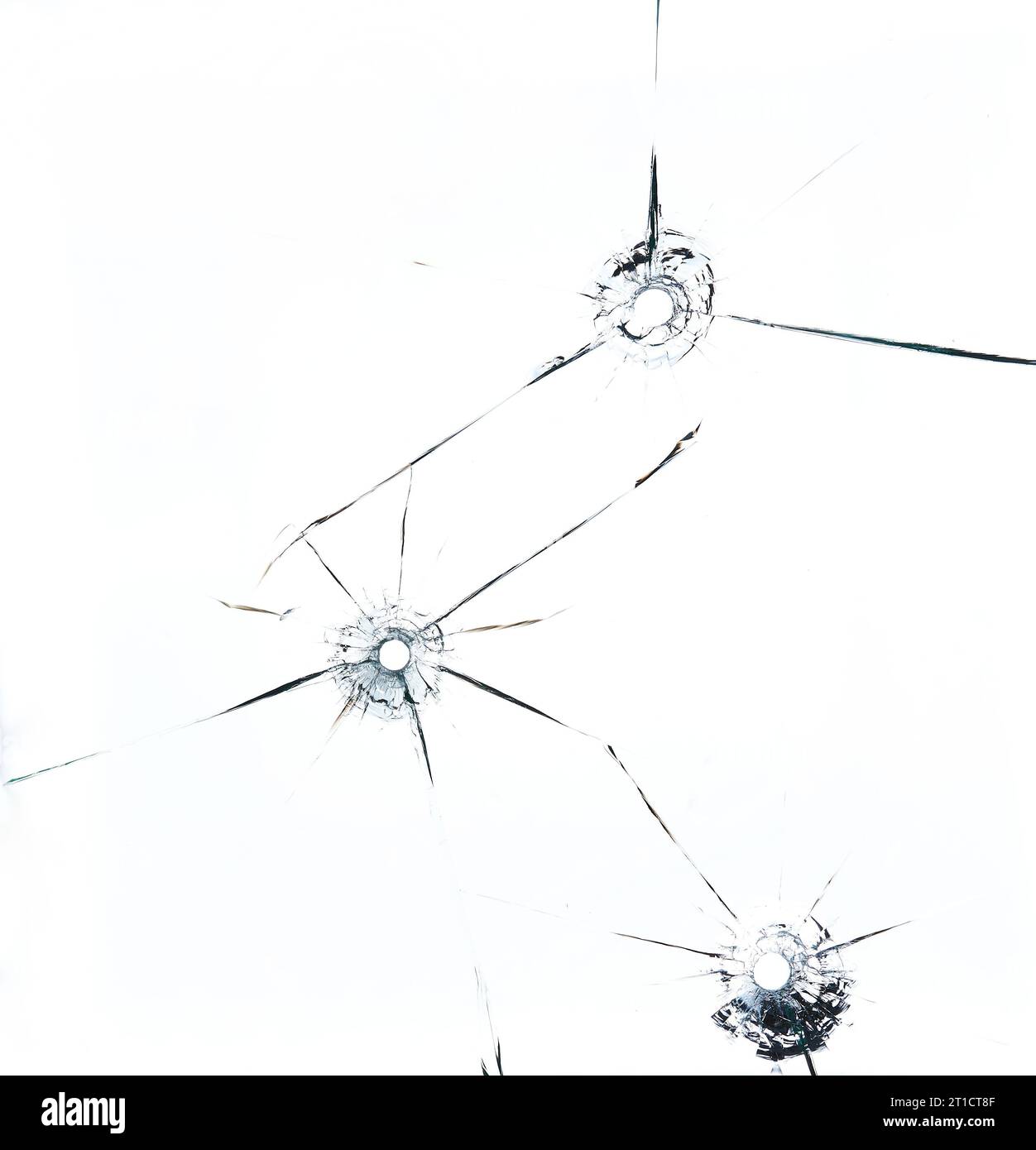 Drei Kugellöcher im Glas auf weißem Hintergrund. Stockfoto